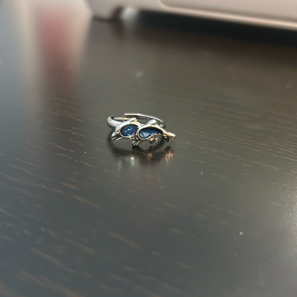 Cute dolphin ring with blue marbled resin in the middle!🤍
